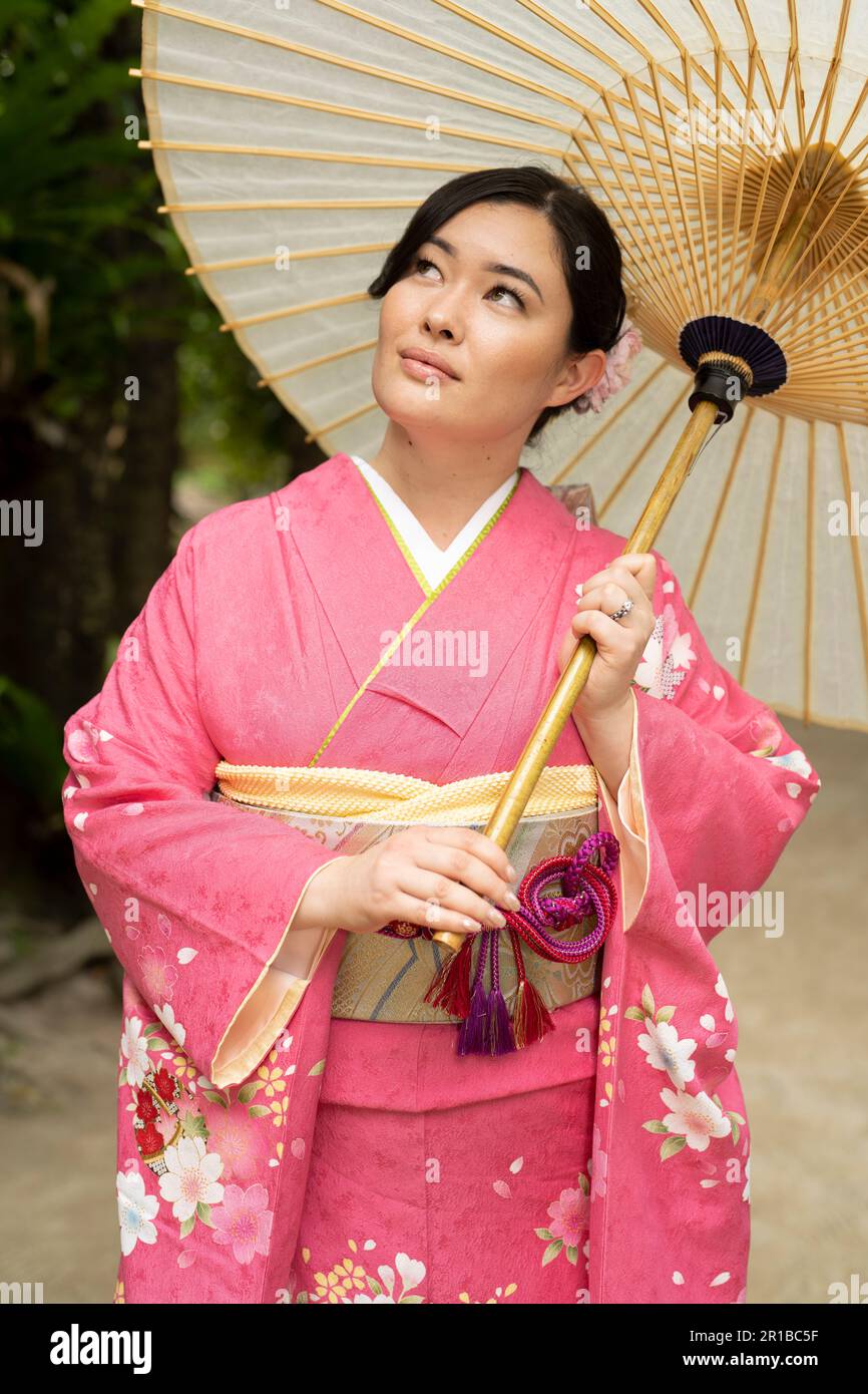 Beautiful young mixed race Japanese / American woman wearing a kimono