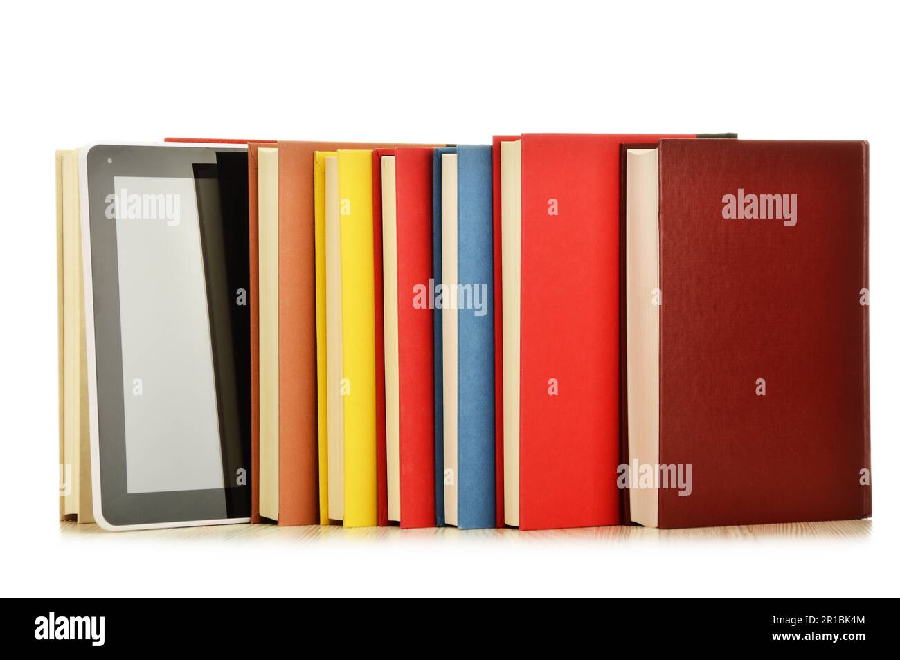 Composition with books and tablet computer isolated on white background Stock Photo