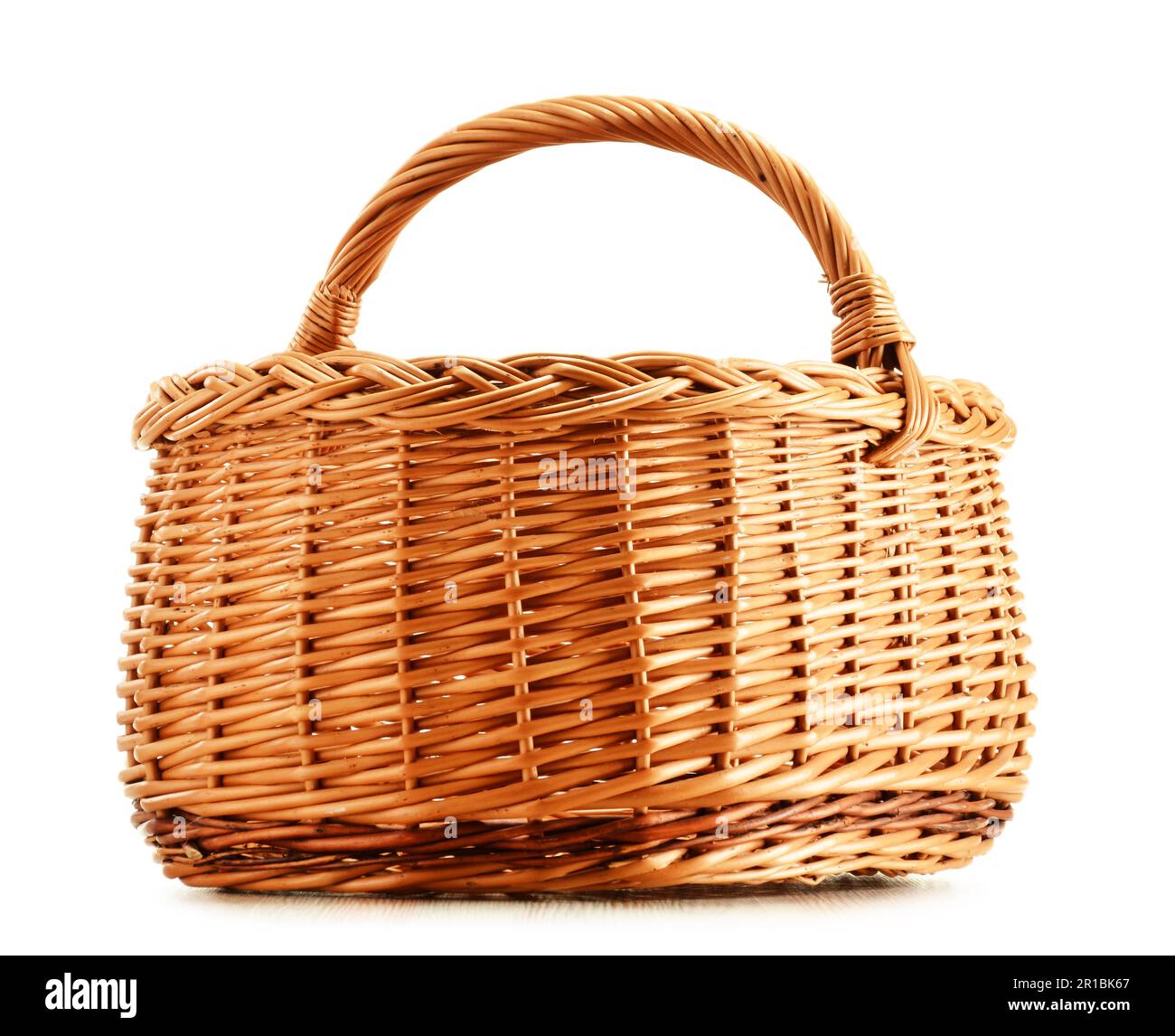 Empty wicker basket isolated on white background Stock Photo - Alamy