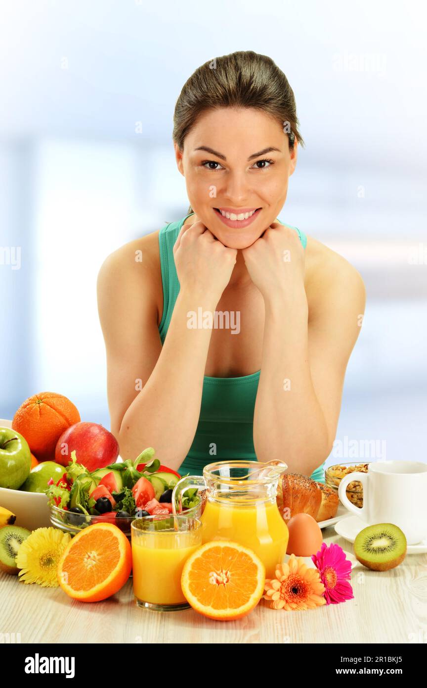 Young woman having breakfast. Balanced diet Stock Photo
