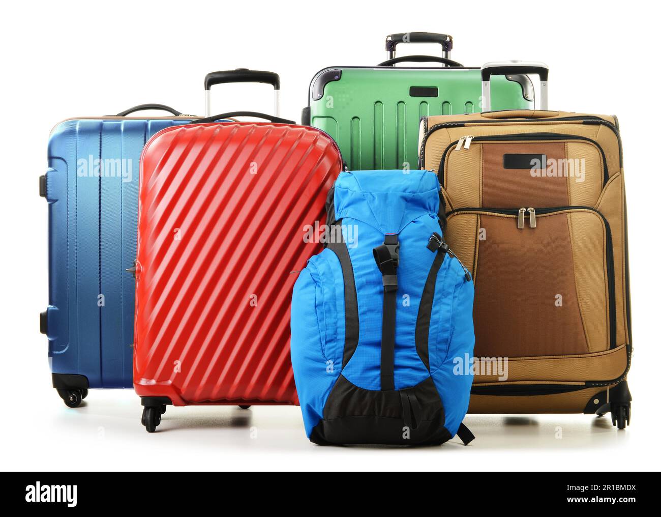 Luggage consisting of large suitcases and rucksacks isolated on white ...