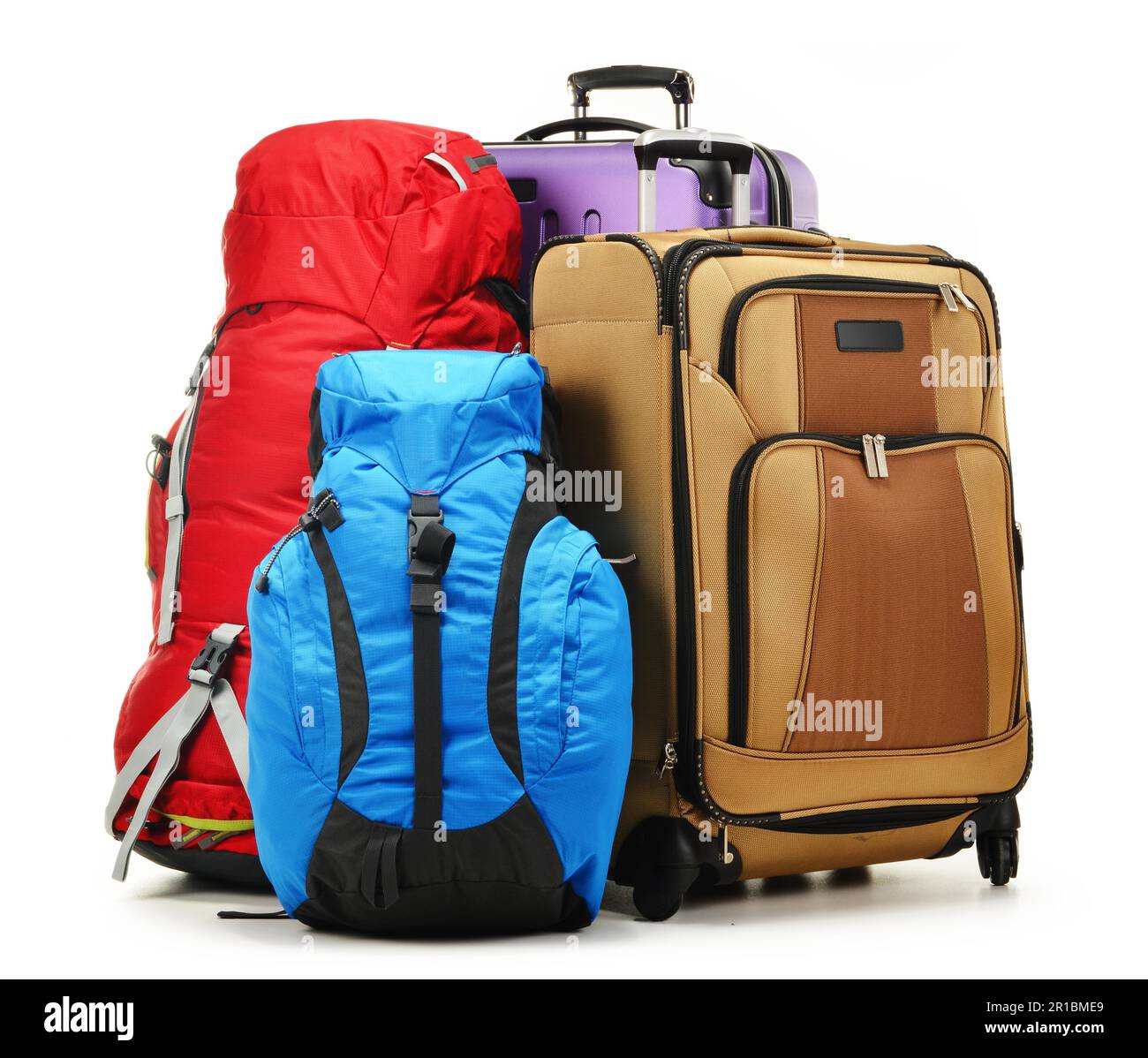 Luggage consisting of large suitcases and rucksacks isolated on white ...