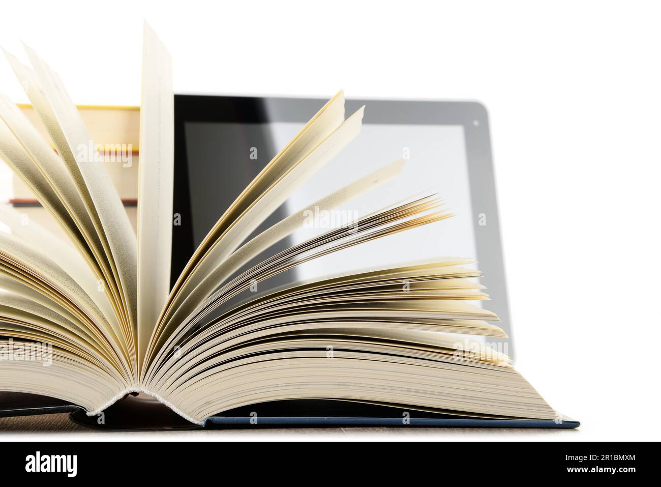 Composition with books and tablet computer isolated on white background Stock Photo