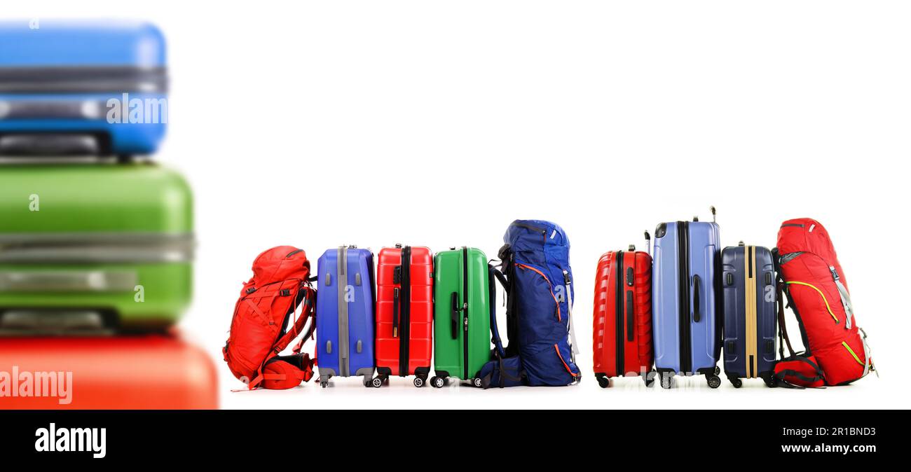 Luggage consisting of large suitcases and backpacks isolated on white Stock Photo Alamy