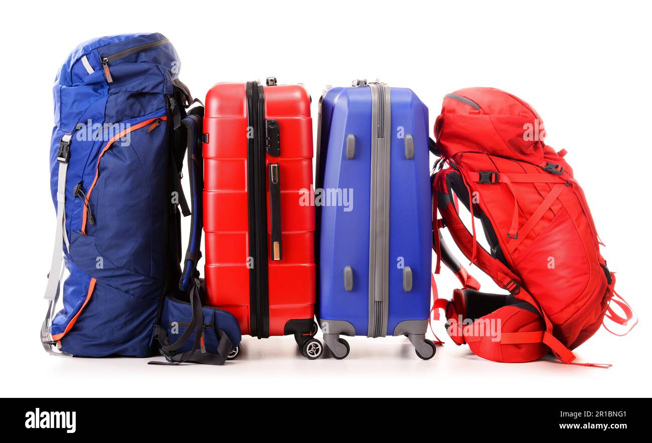 Luggage consisting of large suitcases and rucksacks isolated on white ...