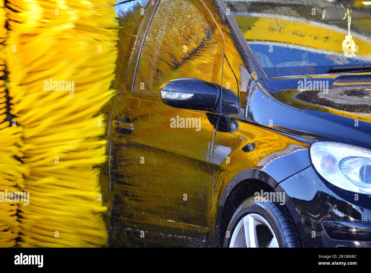 Car going through an automated car wash machine Stock Photo Alamy
