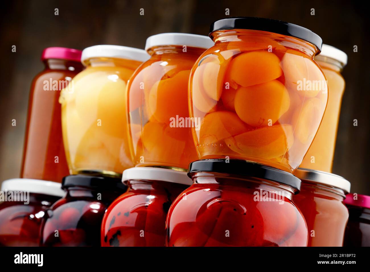 Jars with fruity compotes and jams. Preserved fruits Stock Photo Alamy