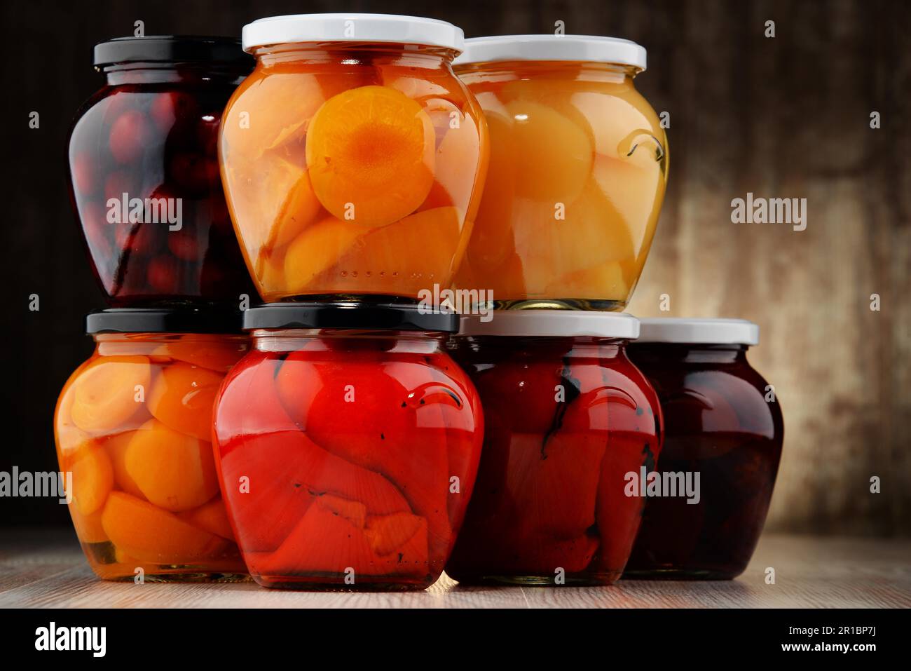 Jars with fruity compotes and jams. Preserved fruits Stock Photo Alamy