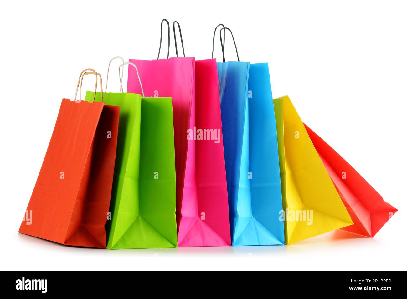 Colorful paper shopping bags isolated on white background Stock Photo ...