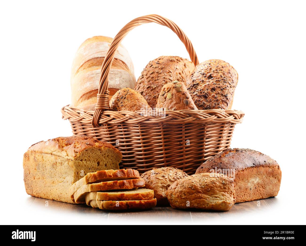 Wicker basket with assorted baking products isolated on white background Stock Photo
