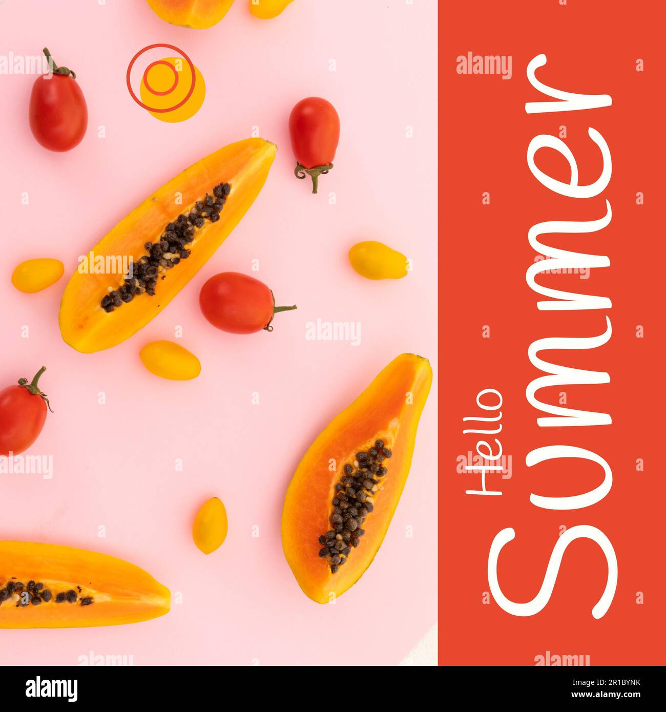 Composite of hello summer text and papayas with red and yellow cherry tomatoes, copy space Stock Photo
