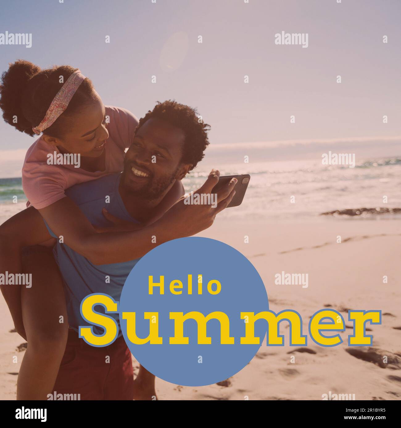 Composite of hello summer text and african american man piggybacking woman taking selfie at beach Stock Photo