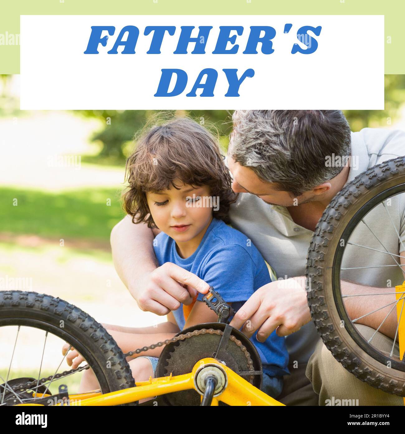 Composition of father's day text over caucasian father with son fixing bike Stock Photo