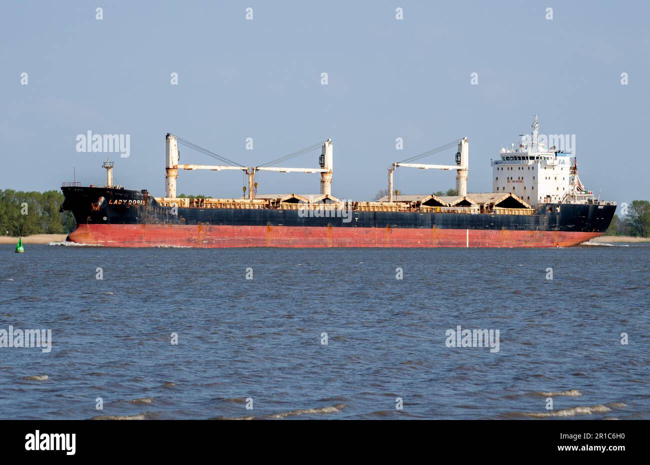 Nordenham, Germany. 12th May, 2023. The cargo ship 'Lady Doris' is underway on the Weser in sunny weather. Credit: Hauke-Christian Dittrich/dpa/Alamy Live News Stock Photo