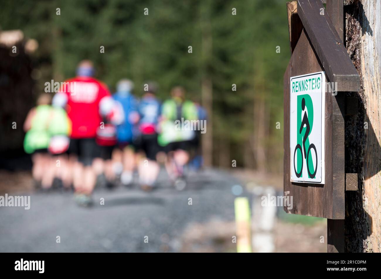 Steinheid, Germany. 13th May, 2023. Runners run on the Rennsteig trail