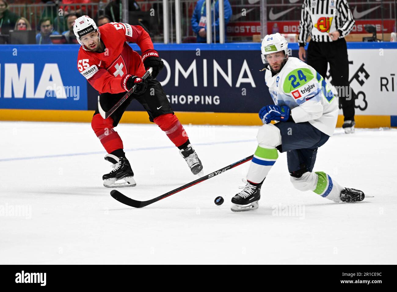 Riga, Latvia. 13th May, 2023. RIGA, LATVIA - MAY 13: Rok Ticar of Slovenia  blocks the shot by Romain Loeffel of Switzerland during the 2023 IIHF Ice  Hockey World Championship Finland -