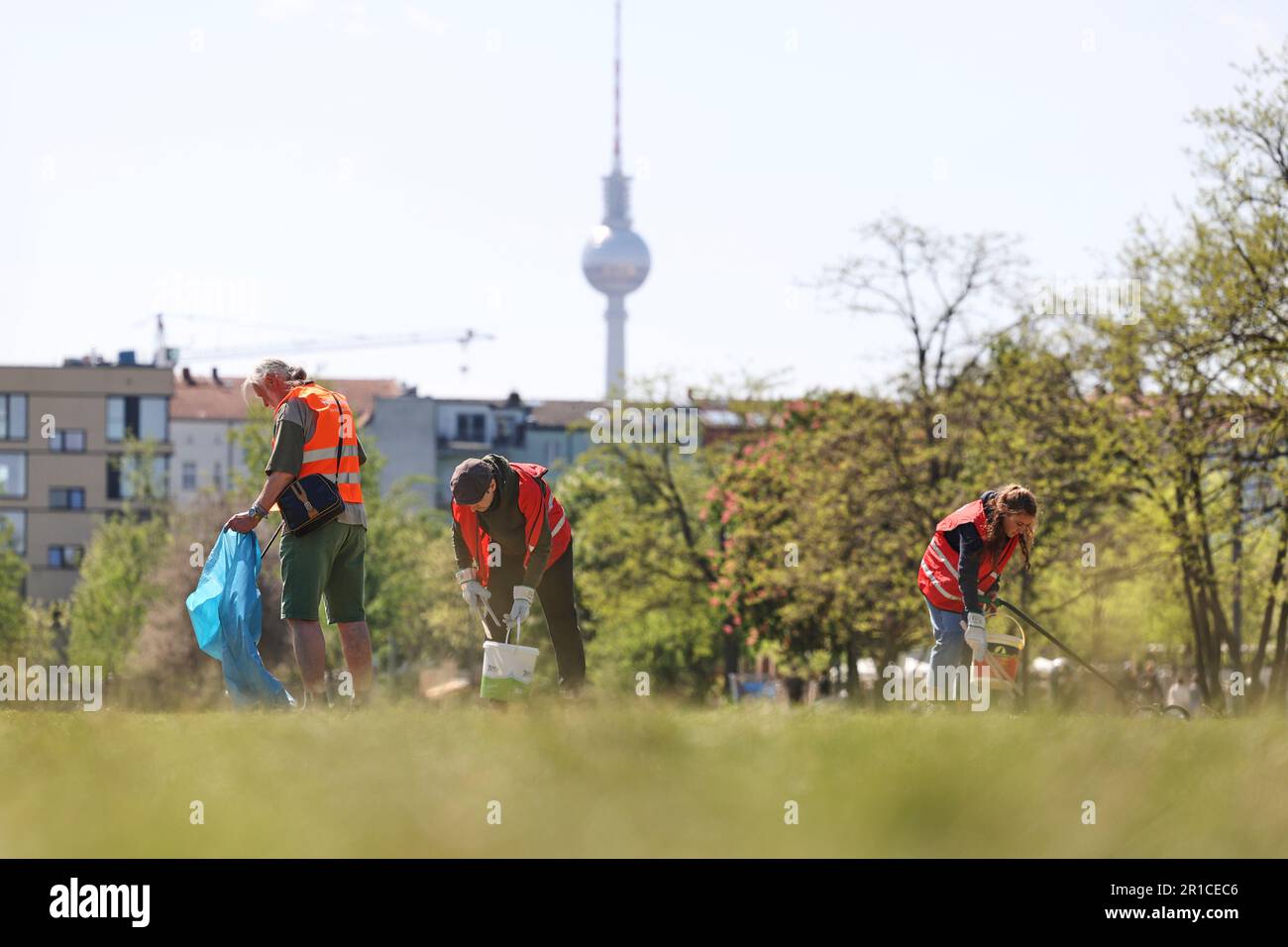Berlin, Germany. 13th May, 2023. Volunteers collect trash during a ...