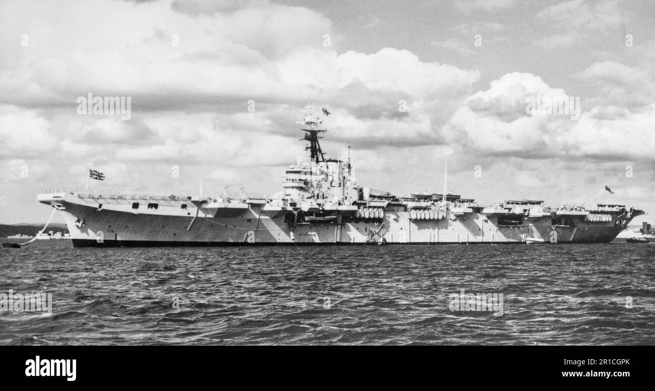 HMS Theseus R64 a Colossus-class light fleet aircraft carrier of the British Royal Navy photographed on 2nd October 1955. Stock Photo