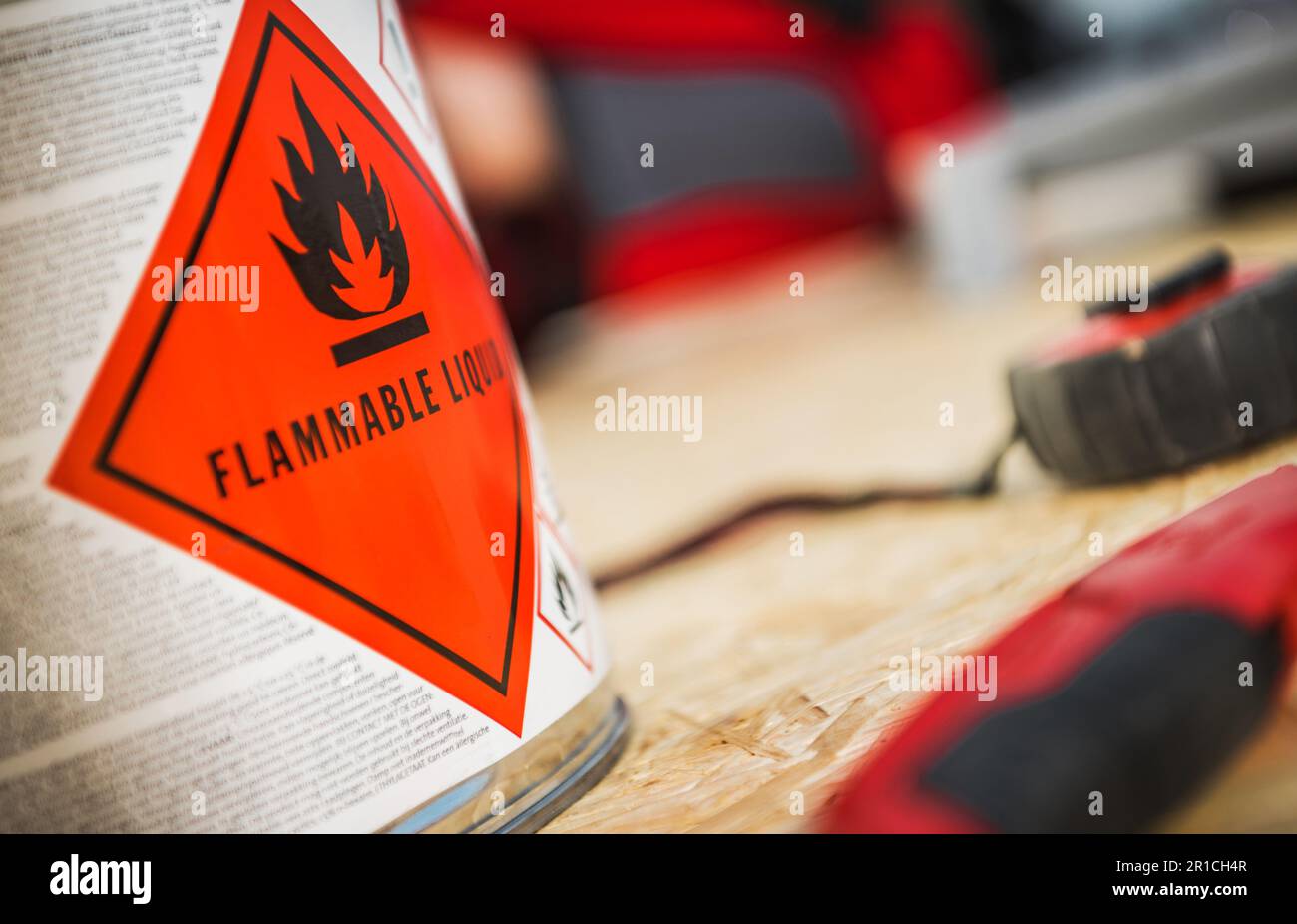 Flammable Liquid at Work. Metal Can with Dangerous Liquid Inside. Stock Photo