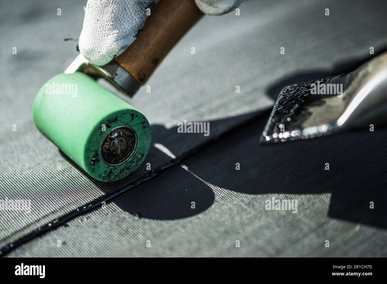 Roof Rubber EPDM Membrane Installation Close Up. Roofing Industry Theme