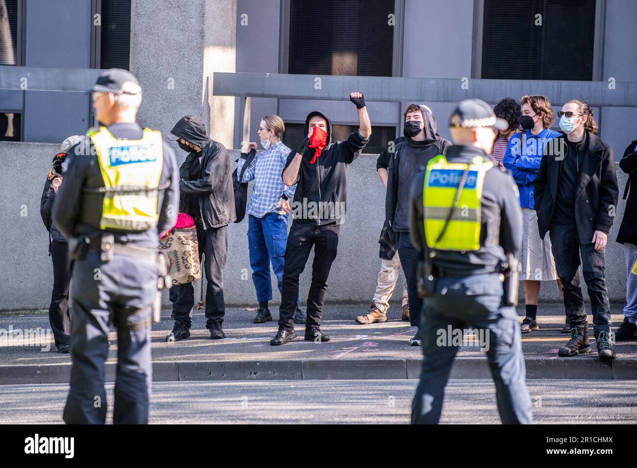 Police Injustice Riot Anti-fascist protesters are held on one side of the road by police ...