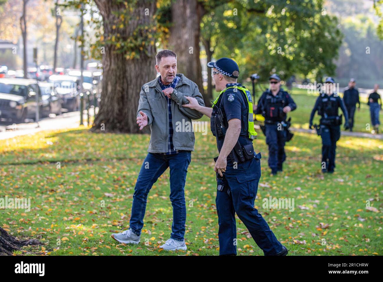 A police inspector moves way a Neo-Nazi protester during the ...