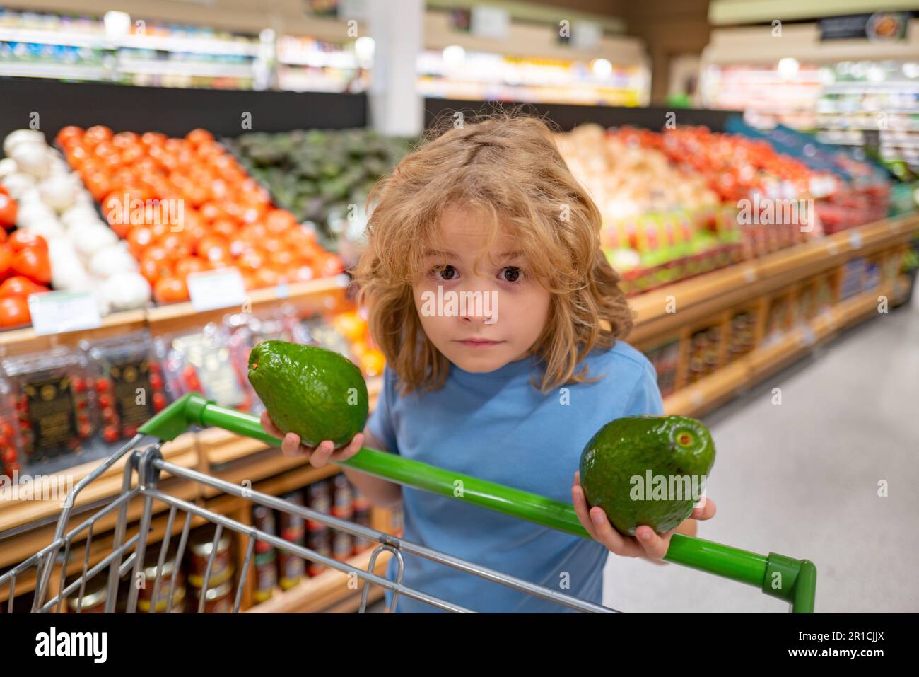 Budva, Montenegro - 17 march 2021: A child with a small trolley in the  supermarket, go shopping with his mother. The family goes shopping Stock  Photo - Alamy