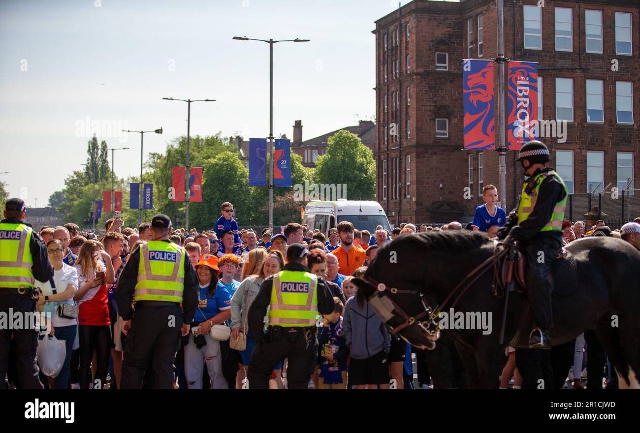 13th May 2023;  Ibrox, Glasgow, Scotland: Scottish Premiership Football, Rangers versus Celtic; Rangers supporters watch the Celtic team bus arrival Stock Photo