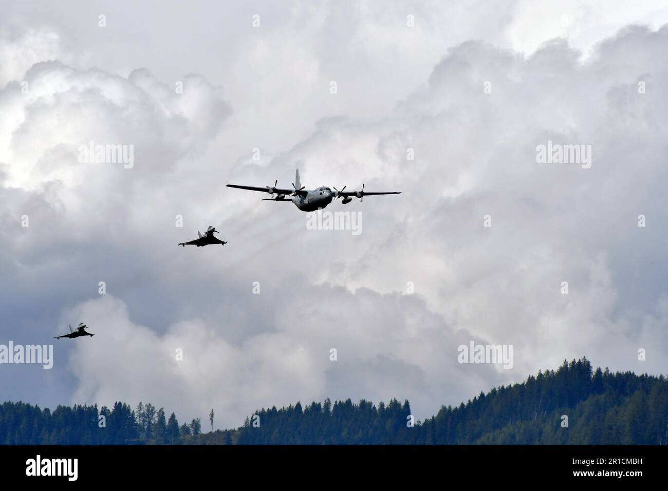 Zeltweg, Austria - September 03, 2022: Public airshow in Styria named Airpower 22, display with Hercules C130 and two Eurofighter Typhoon from Austria Stock Photo
