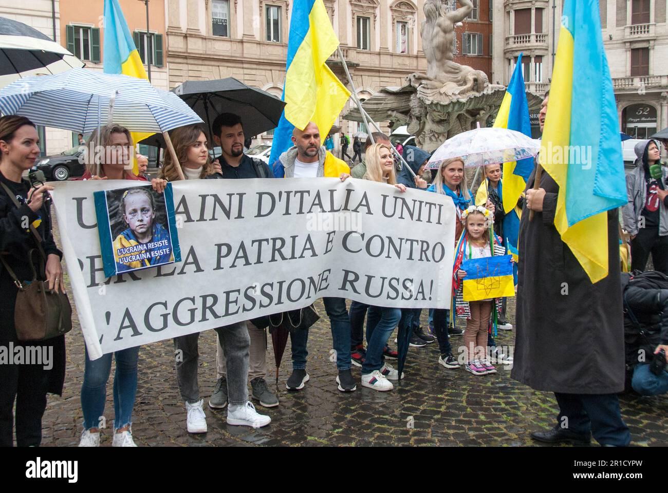 Rome, Italy. 13th May, 2023. 13/05/2023 Rome, The Ukrainian community awaiting the procession of President Volodmyr Zelensky in Piazza Barberini. Ps: the photo can be used respecting the context in which it was taken, and without defamatory intent of the decorum of the people represented. Credit: Independent Photo Agency/Alamy Live News Stock Photo