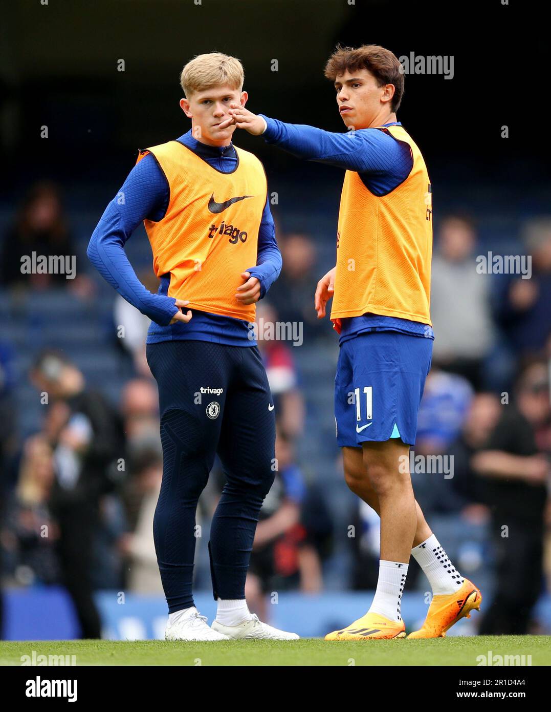 Chelsea's Lewis Hall (left) with Joao Felix on the pitch during the ...