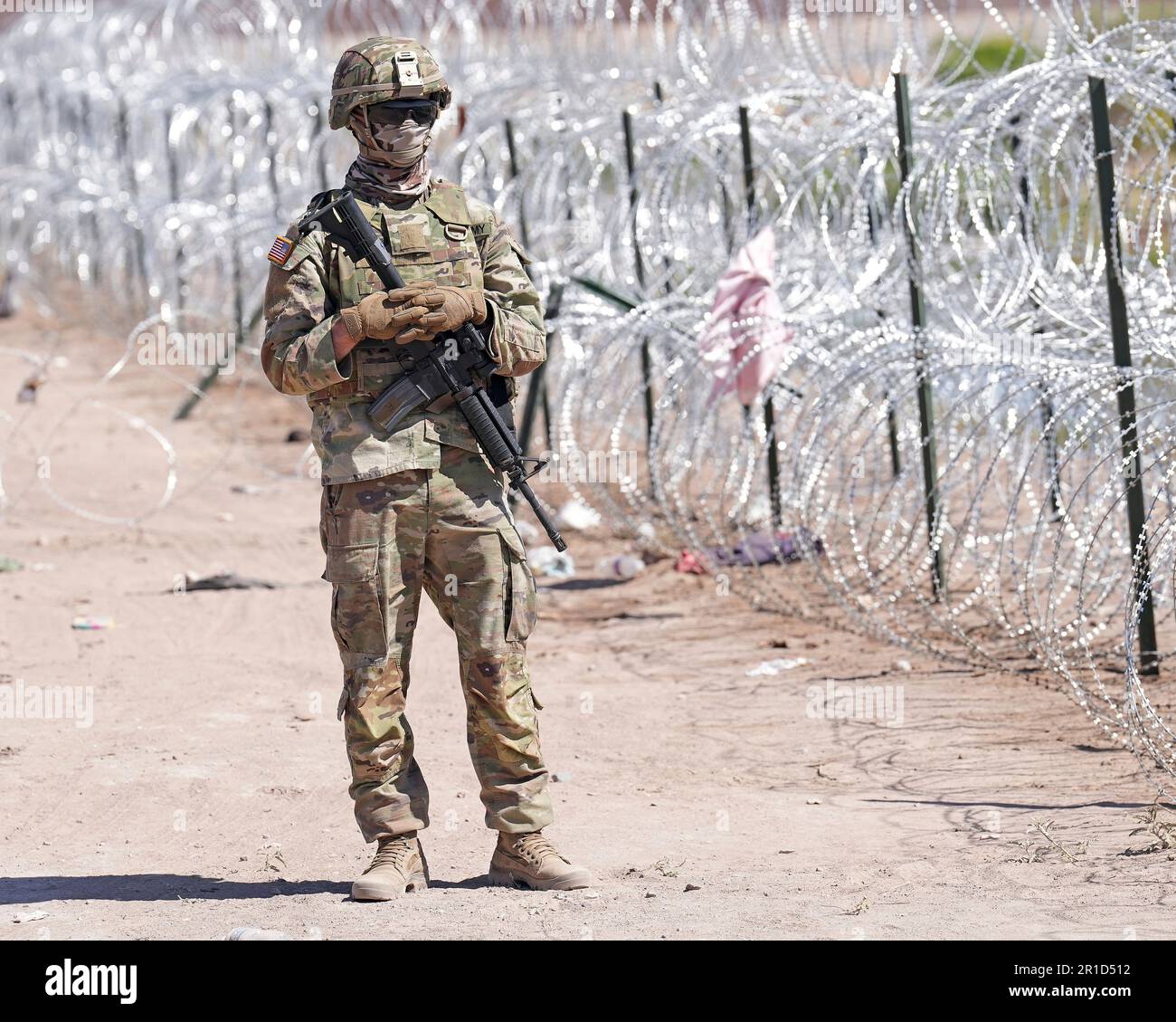 El Paso, United States. 11th May, 2023. Texas Army National Guard soldiers with the governors self-styled Texas Tactical Border Force, guard the border with Mexico as part of Operation Lone Star Task Force West, May 11, 2023 near El Paso, Texas. The fear over a migrant surge after Title 42 expired failed to materialize with fewer migrants risking the tougher penalties under the new Title 8 rules. Credit: Mark Otte/Texas National Guard/Alamy Live News Stock Photo