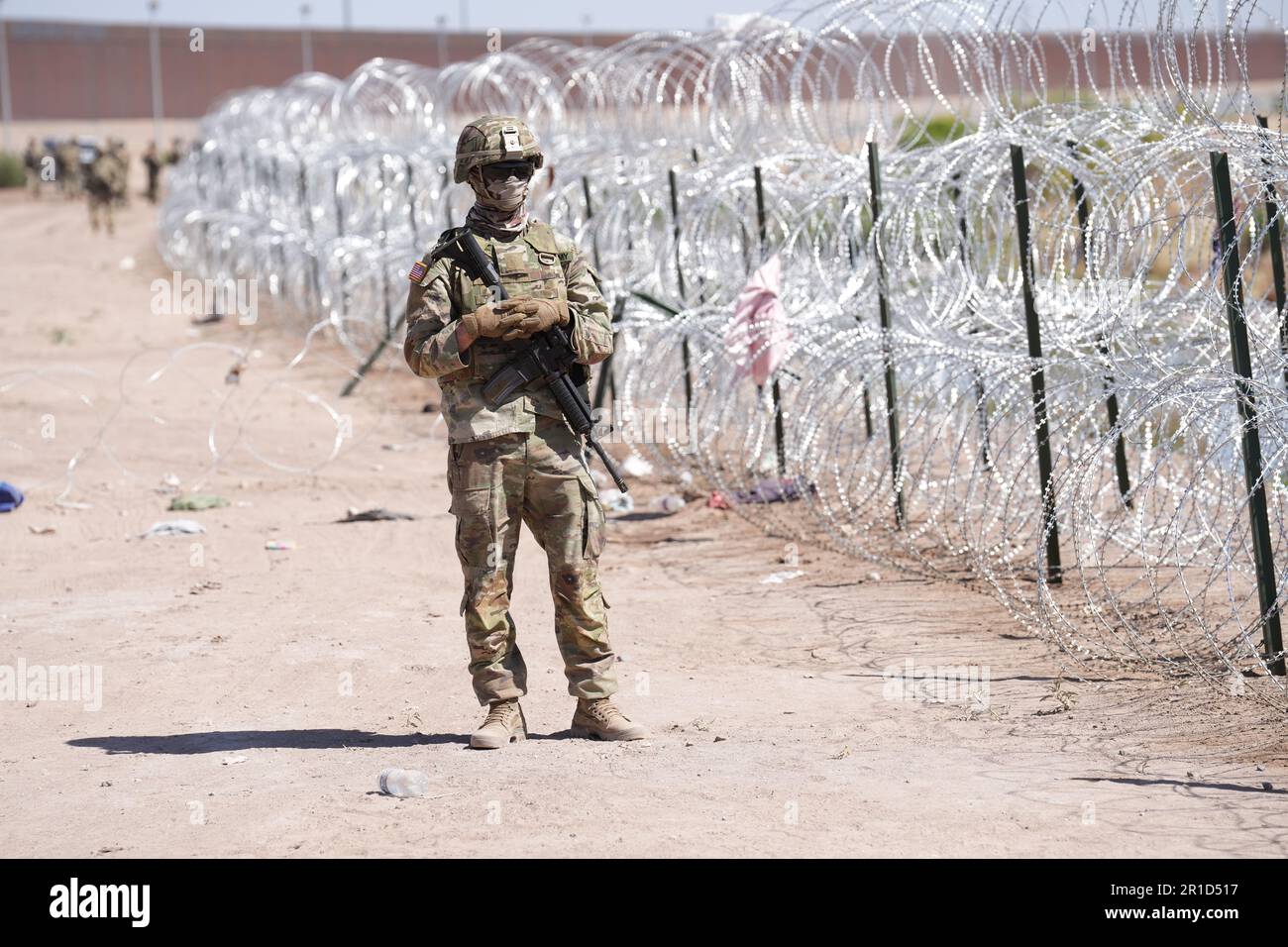 El Paso, United States. 11th May, 2023. Texas Army National Guard soldiers with the governors self-styled Texas Tactical Border Force, guard the border with Mexico as part of Operation Lone Star Task Force West, May 11, 2023 near El Paso, Texas. The fear over a migrant surge after Title 42 expired failed to materialize with fewer migrants risking the tougher penalties under the new Title 8 rules. Credit: Mark Otte/Texas National Guard/Alamy Live News Stock Photo