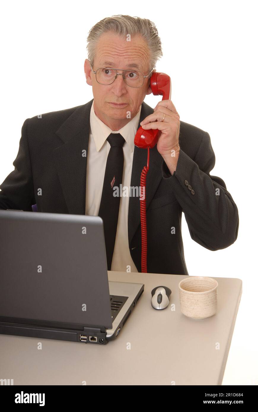 Senior businessman with a rather interesting expression Stock Photo