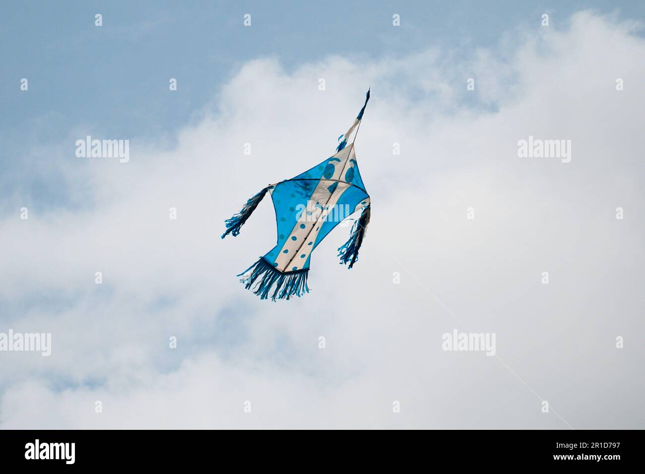 Beautiful happy face kite flying in the sky Stock Photo