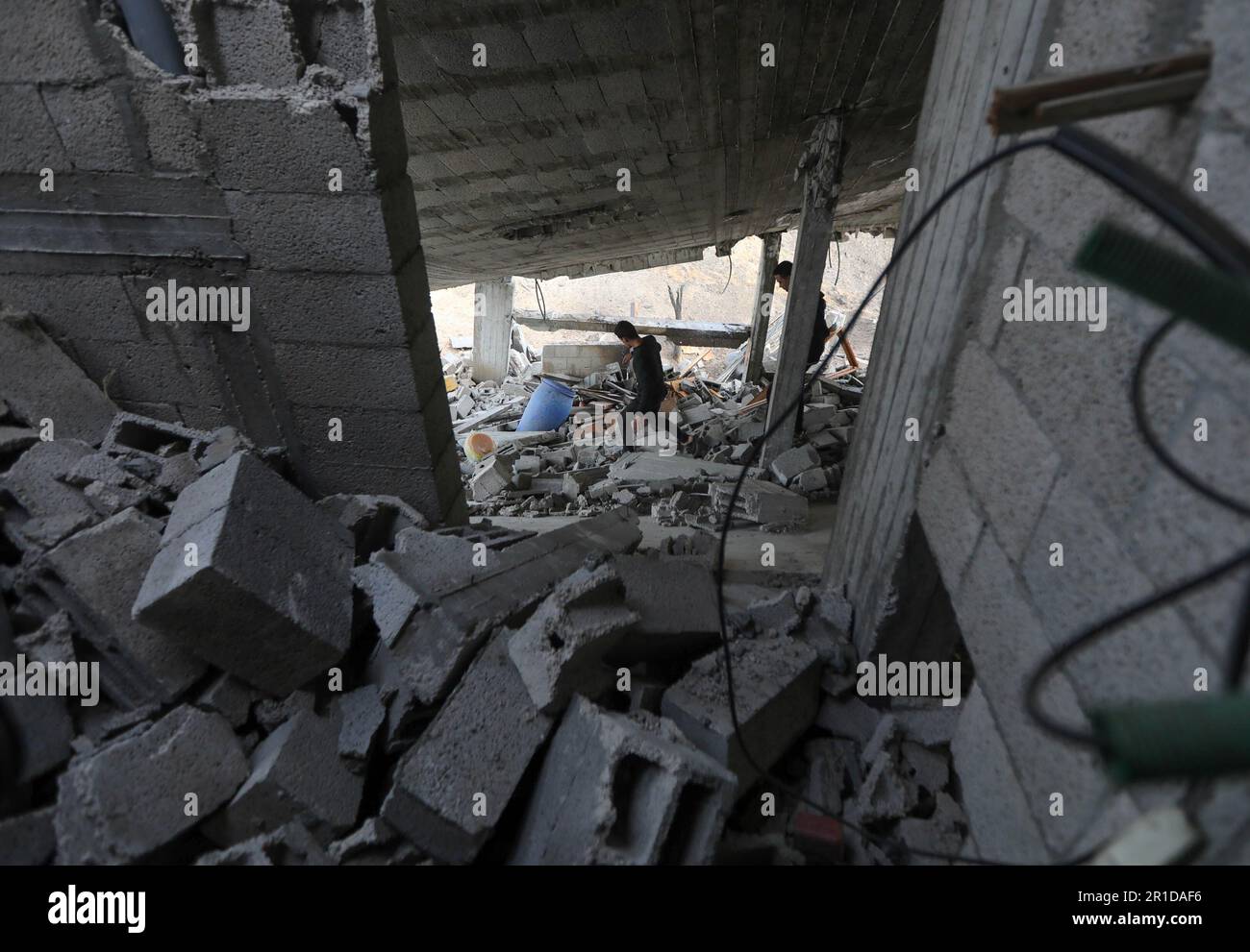 Gaza, Palestine. 12th May, 2023. View of Palestinian's buildings hit by an Israeli air strike in Deir al-Balah, central Gaza Strip. (Photo by Yousef Masoud/SOPA Images/Sipa USA) Credit: Sipa USA/Alamy Live News Stock Photo