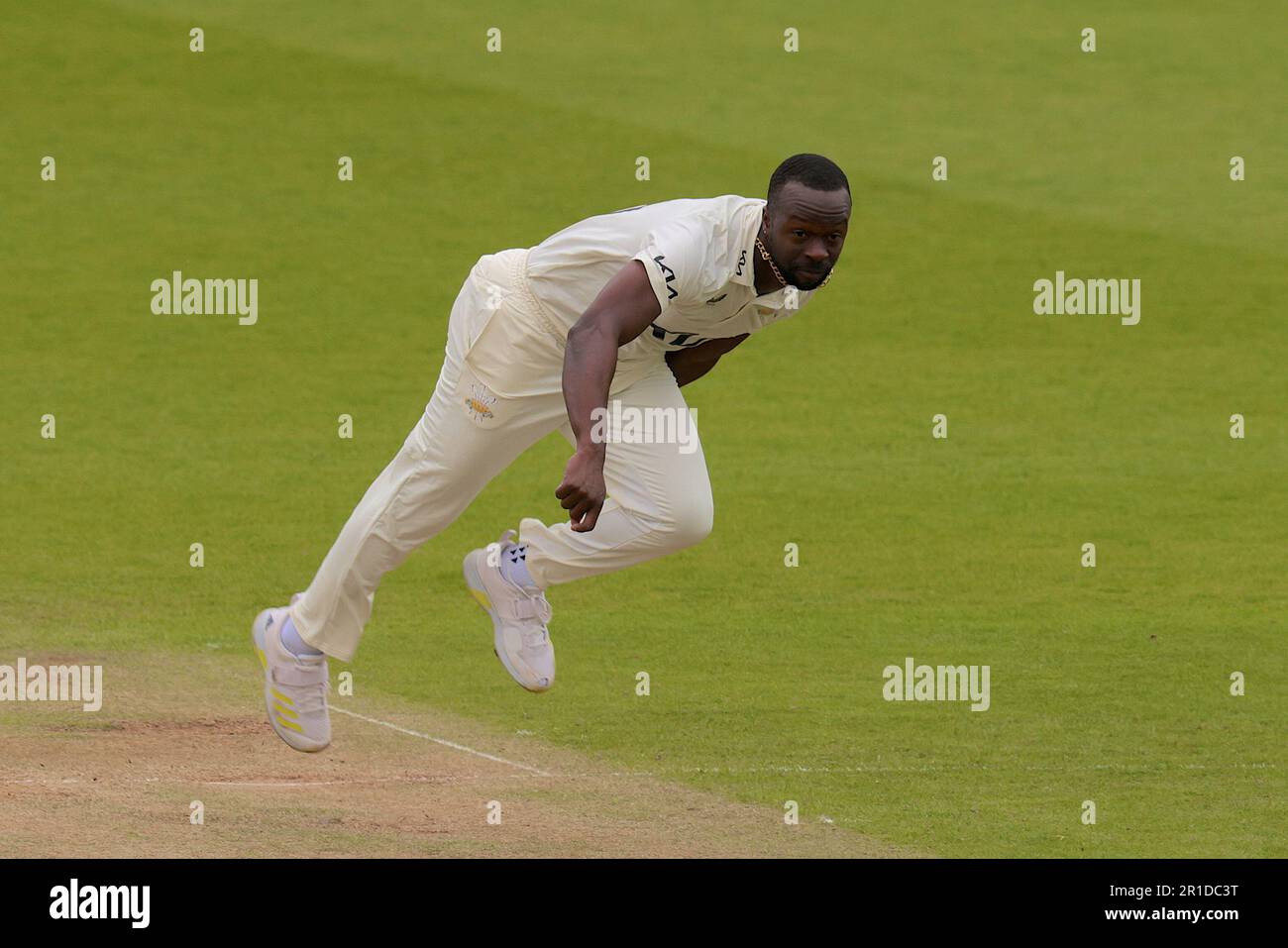 London, UK. 13 May, 2023. London, UK. Surrey’s Kemar Roach bowling as Surrey take on Middlesex in the County Championship at the Kia Oval, day three David Rowe/Alamy Live News Credit: David Rowe/Alamy Live News Stock Photo