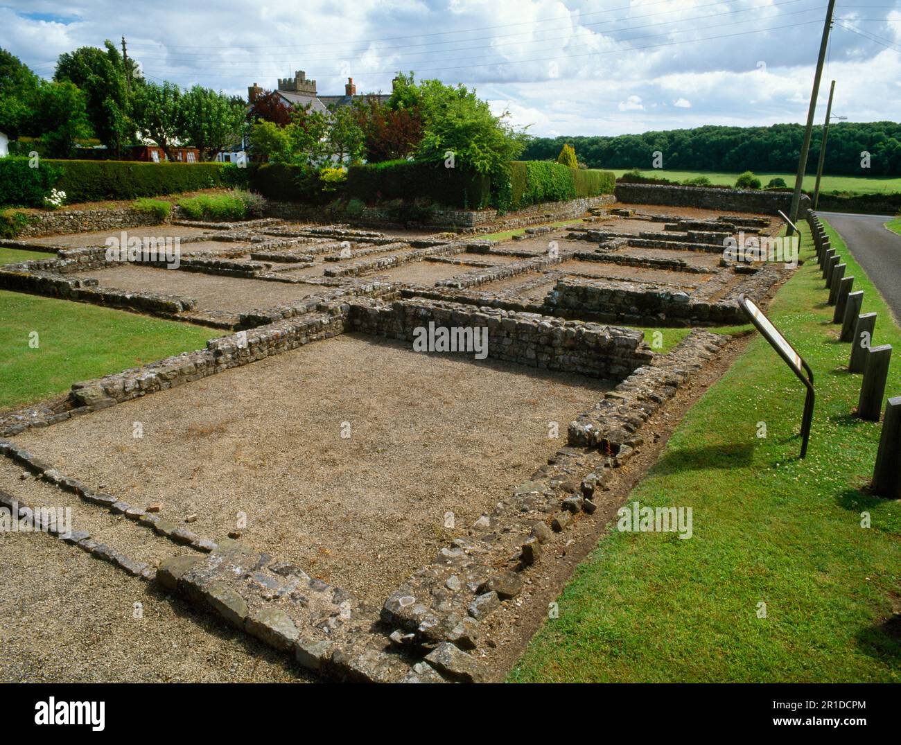 View S of the excavated foundations of several phases (late C1st-C4thAD) of Roman buildings on Pound Lane, Caerwent Roman town (Venta Silurum), Wales. Stock Photo