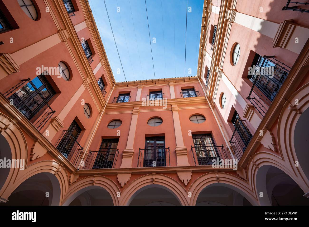 Arcaded Courtyard at Bishops Palace (Episcopal Palace) - Malaga, Andalusia, Spain Stock Photo