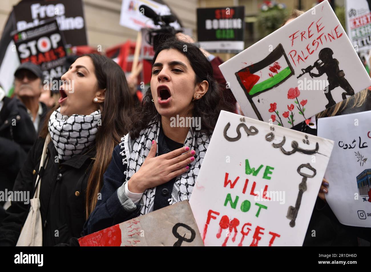 London, England, UK. 13th May, 2023. Protester shouts slogans during the rally in central London. Demonstrators march in support for Palestine in central London. Palestinians commemorate the 75th anniversary of Nakba Day, also known as the Palestinian Catastrophe, which involved the destruction of Palestinian society in 1948, as well as the continuing displacement of many Palestinian people from their homeland. (Credit Image: © Thomas Krych/ZUMA Press Wire) EDITORIAL USAGE ONLY! Not for Commercial USAGE! Stock Photo