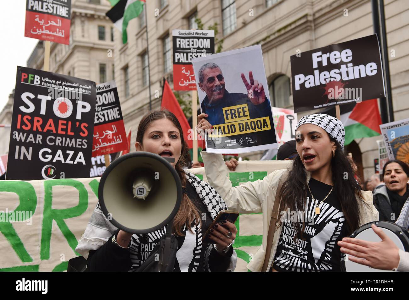 London, England, UK. 13th May, 2023. Protester shouts slogans through a megaphone, at the rally in central London. Palestinians commemorate the 75th anniversary of Nakba Day, also known as the Palestinian Catastrophe, which involved the destruction of Palestinian society in 1948, as well as the continuing displacement of many Palestinian people from their homeland. (Credit Image: © Thomas Krych/ZUMA Press Wire) EDITORIAL USAGE ONLY! Not for Commercial USAGE! Stock Photo