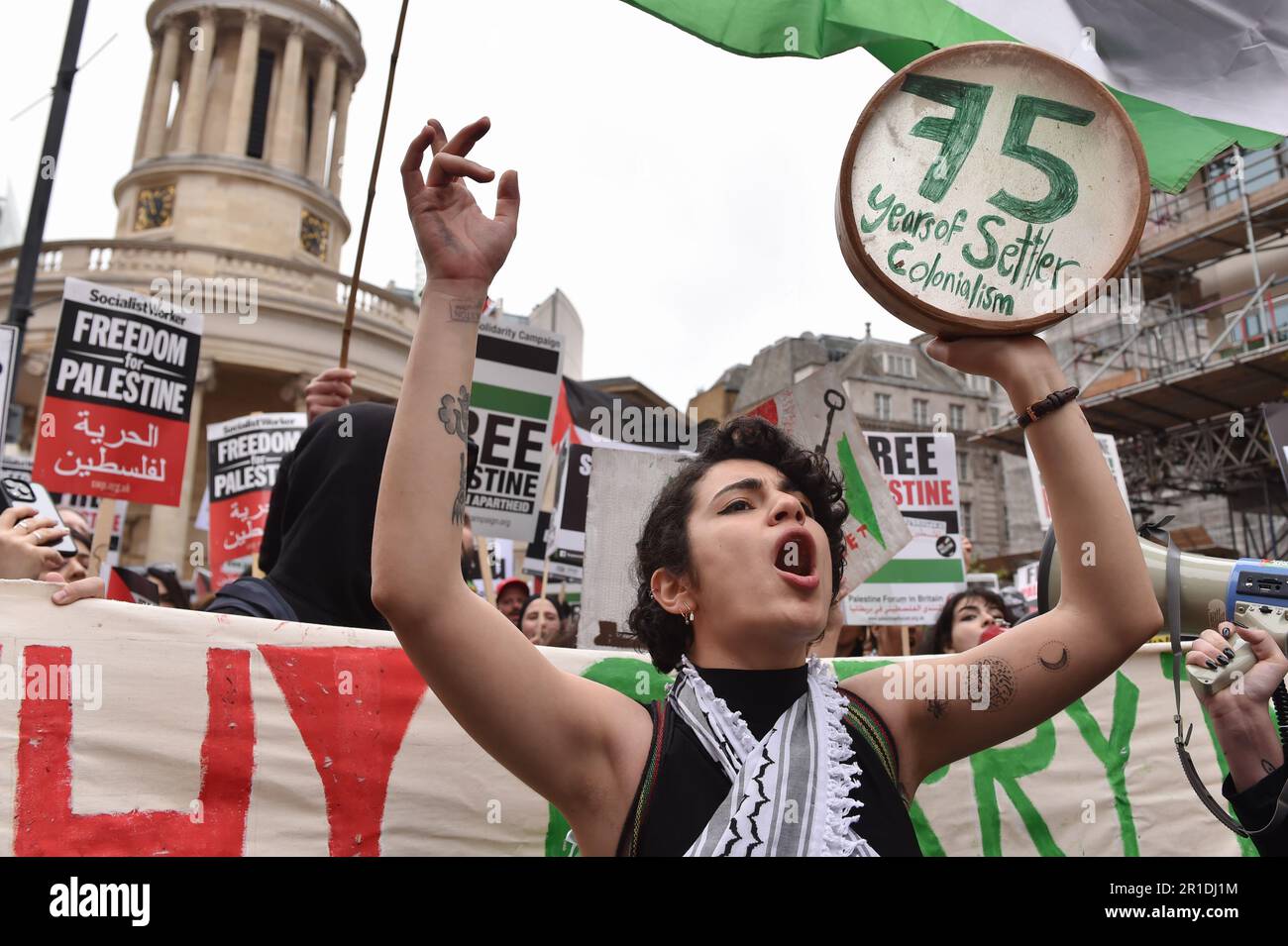 London, England, UK. 13th May, 2023. Demonstrator shouts slogans during the rally in central London. Palestinians commemorate the 75th anniversary of Nakba Day, also known as the Palestinian Catastrophe, which involved the destruction of Palestinian society in 1948, as well as the continuing displacement of many Palestinian people from their homeland. (Credit Image: © Thomas Krych/ZUMA Press Wire) EDITORIAL USAGE ONLY! Not for Commercial USAGE! Stock Photo