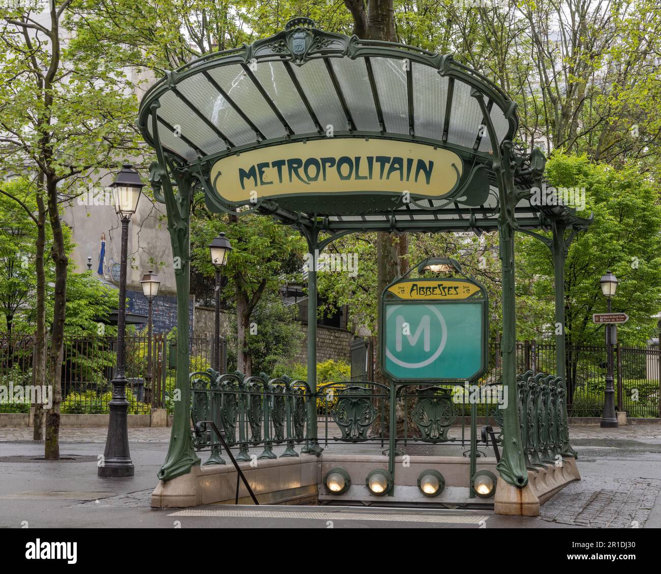 Paris, France.  Metro station entrance at Abbesses station near Montmartre. Vintage subway entrance designed by Hector Guimard Stock Photo