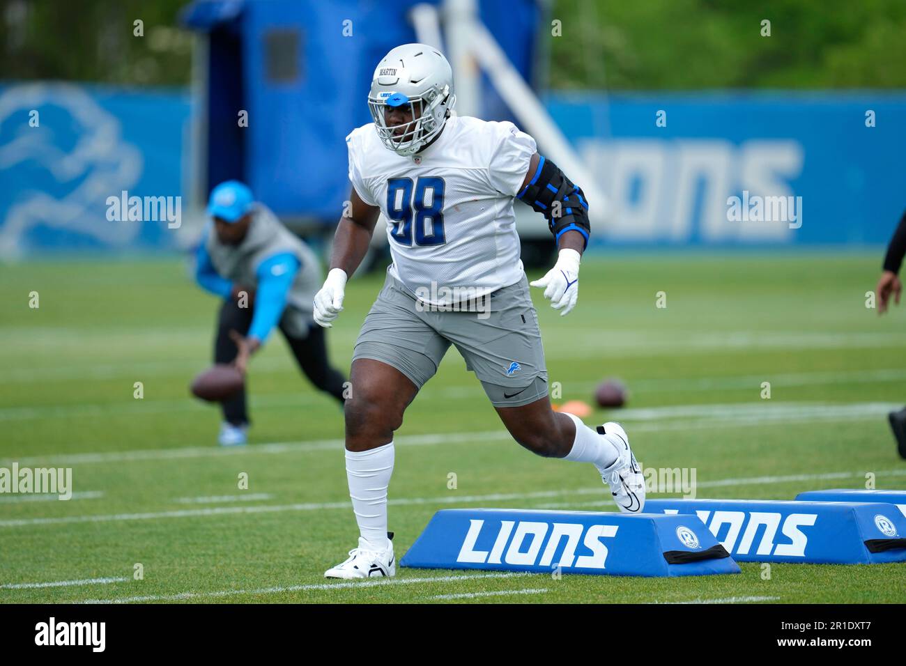 Detroit Lions Defensive Tackle Brodric Martin Runs A Drill During An ...