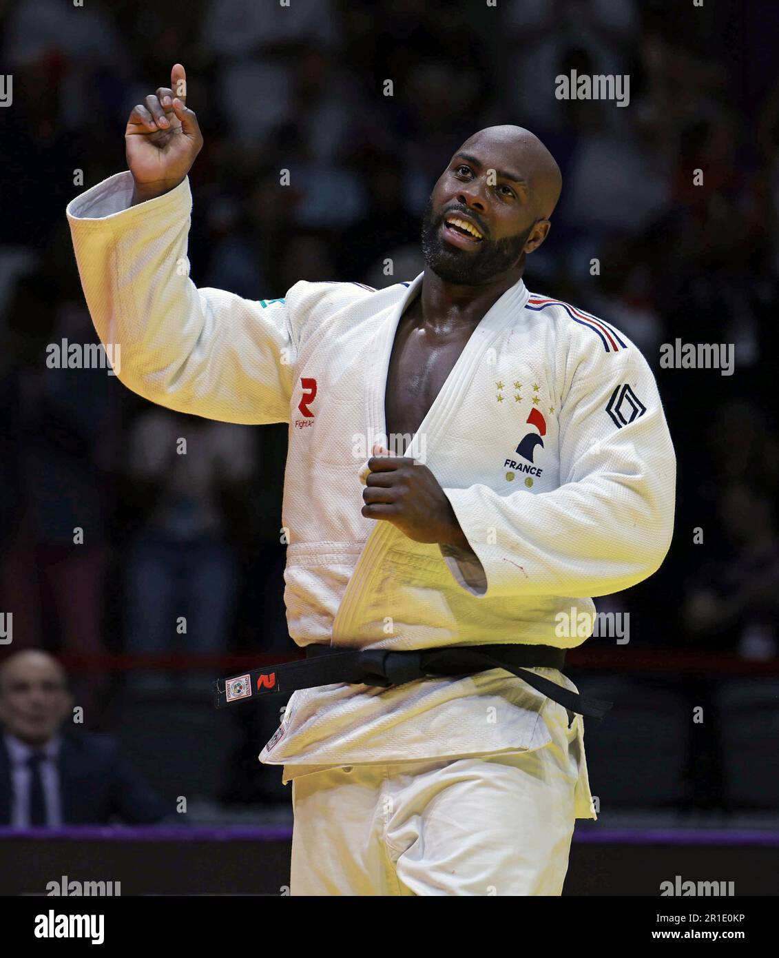 France's Teddy Riner celebrates after winning the men's +100kg class ...