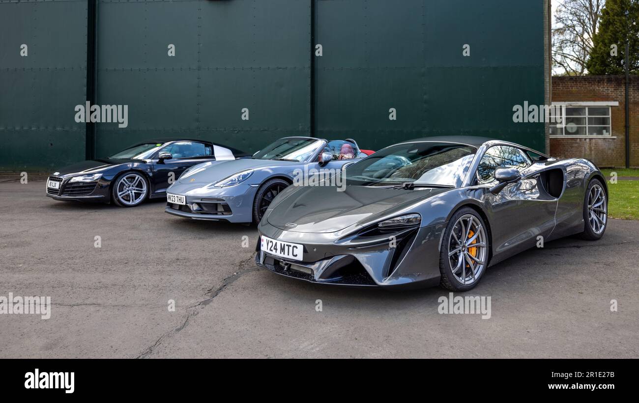 McLaren Artura, Porsche & Audi R8, on display at the April Scramble held at the Bicester Heritage centre on the 23 April 2023. Stock Photo