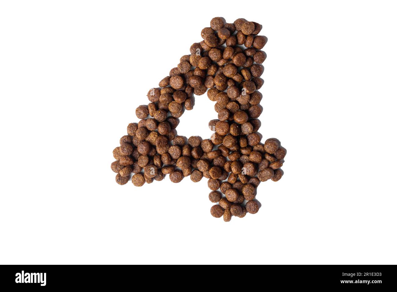 Number 4 made from dry pet food on a white background. Design, layout. Dietary therapeutic nutrition for dogs and cats. Favorite food for animals. Car Stock Photo