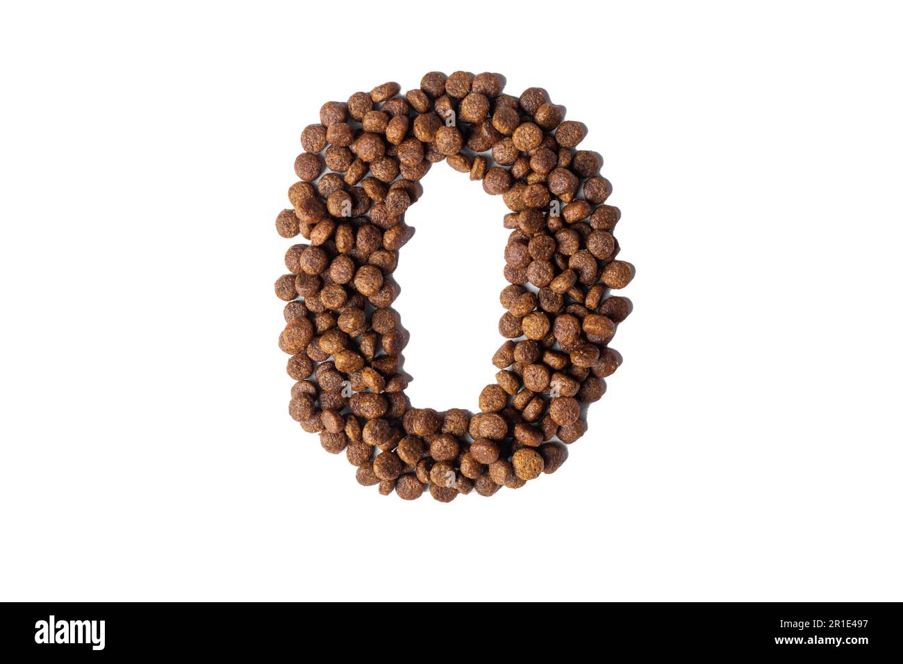 Number 0 made from dry pet food on a white background. Design, layout. Dietary therapeutic nutrition for dogs and cats. Favorite food for animals. Car Stock Photo