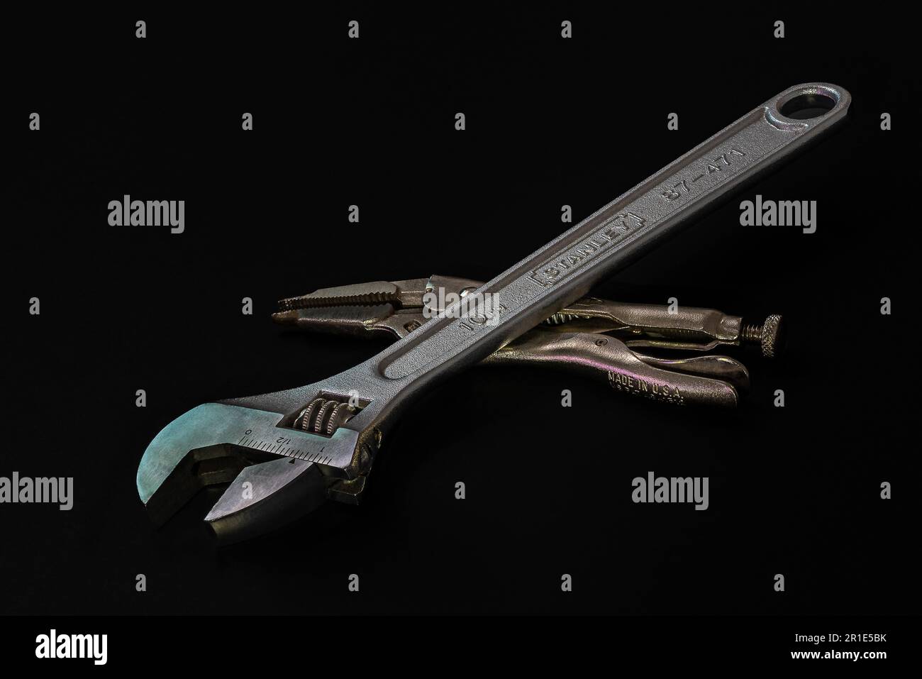 Adjustable mechanical wrench and original ViseGrip crimping pliers