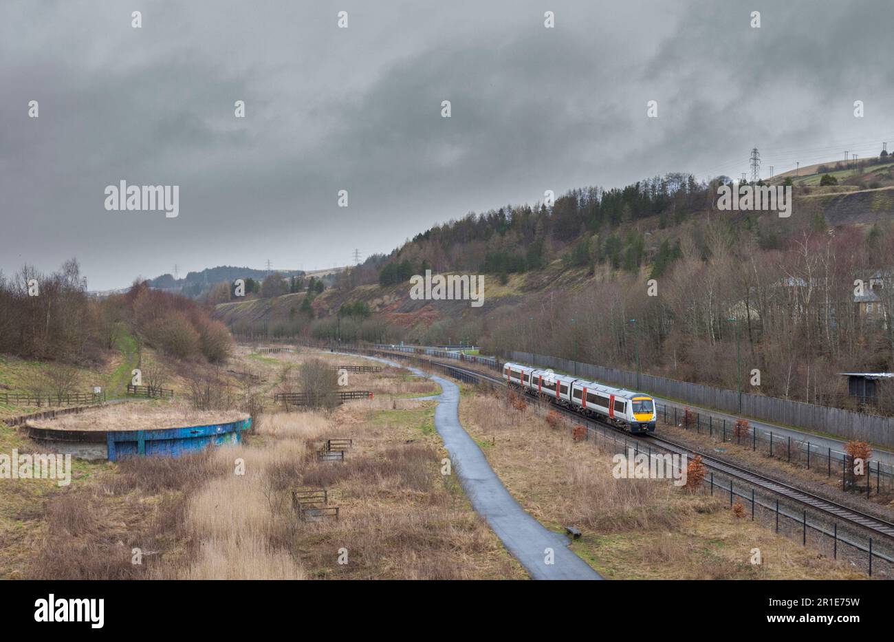 Transport For Wales class 170 Bombardier Turbostar train on the Ebbw Vale line approaching journeys end on the single track line Stock Photo